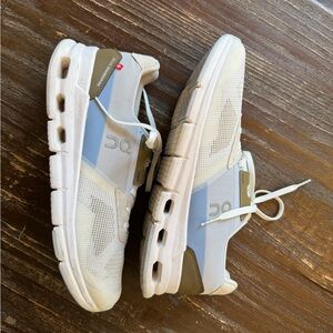 On Running Cream and Light Blue Sneakers